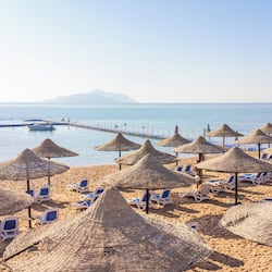 Private beach, free beach shuttle, beach bar