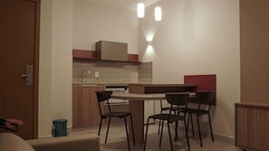 Deluxe Apartment | Private kitchen | High chair - Privé Praias do Lago Eco Resort (Caldas Novas)