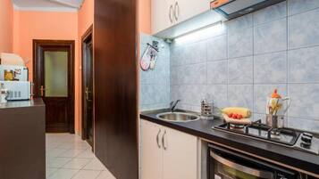 Apartment (Two Bedroom Apartment) | Private kitchen | Fridge