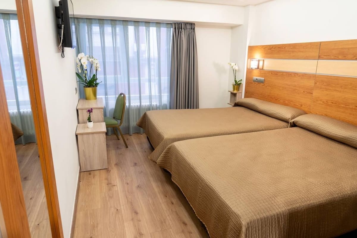 2 Single Beds, Premium Room | Desk, free WiFi, bed sheets