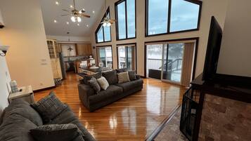 Premium House | Living area | 55-inch Smart TV with satellite channels, TV, fireplace