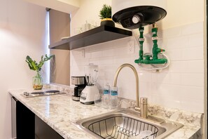 City Double Room | Private kitchen | Full-size fridge, microwave, coffee/tea maker, blender