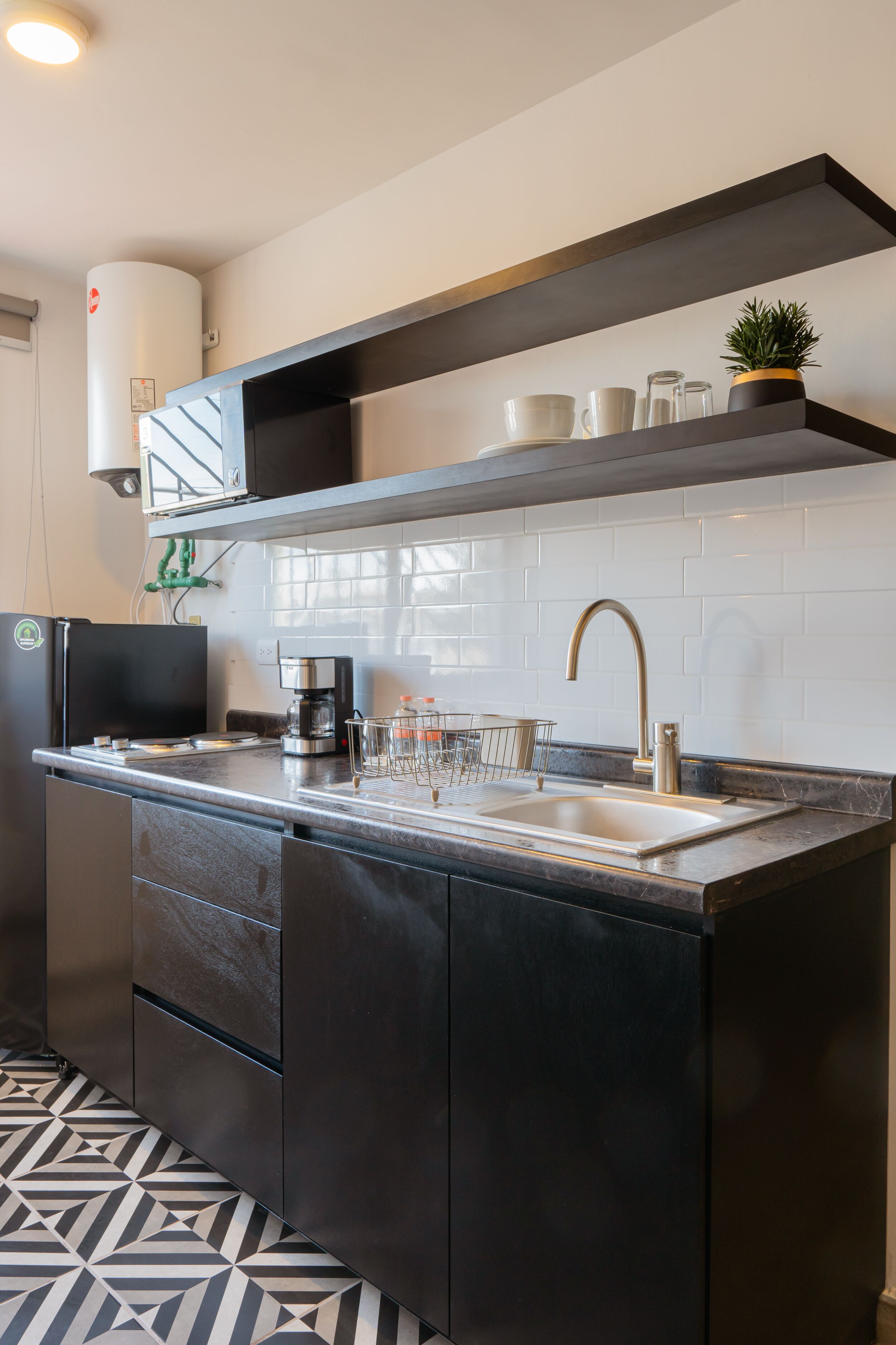 Design Double Room | Private kitchen | Full-size fridge, microwave, coffee/tea maker, blender