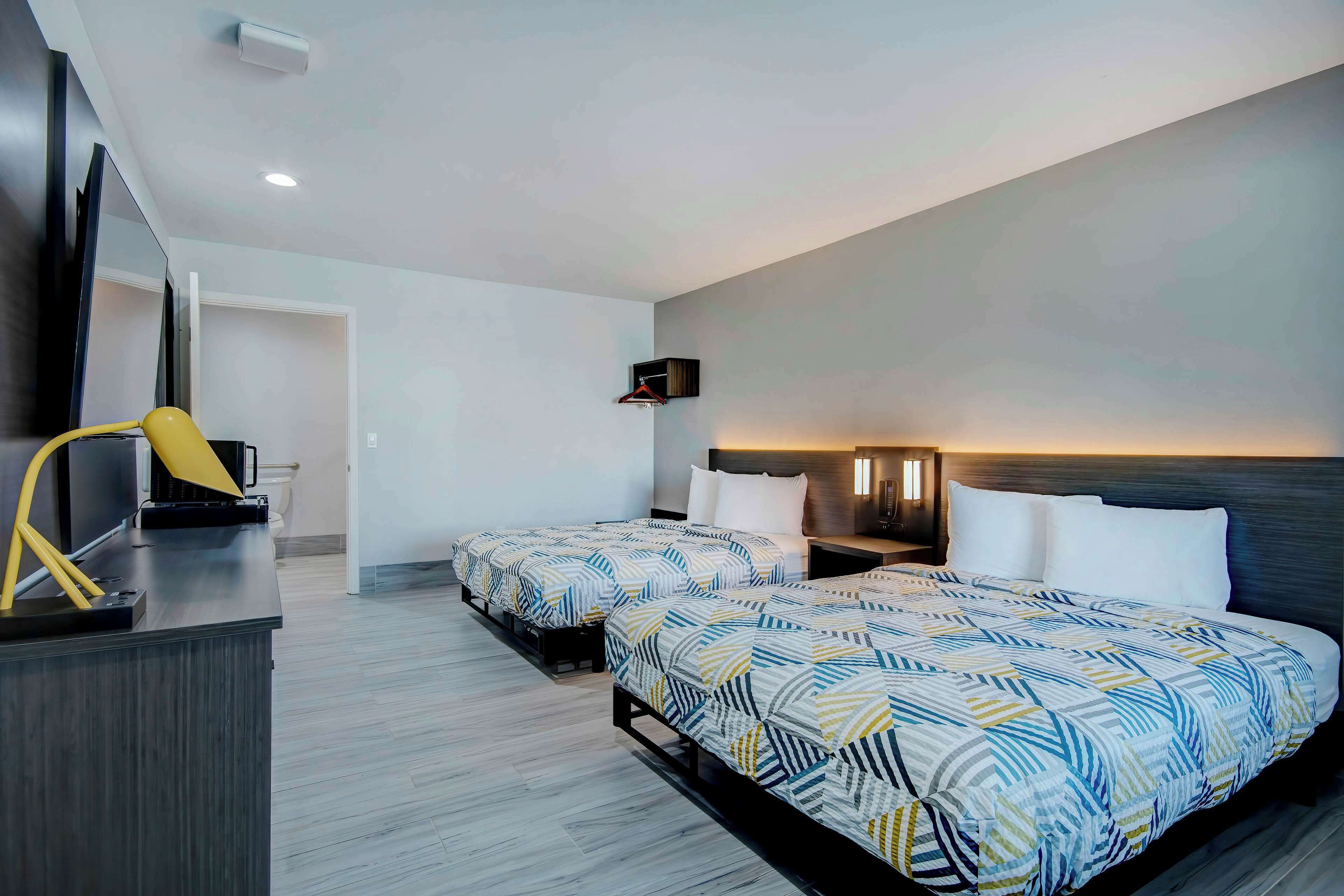 Desk, laptop workspace, free WiFi, bed sheets