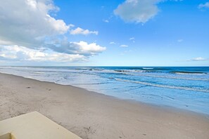 On the beach, sun loungers, beach towels - Spectacular direct ocean front condo with amazing views of the Atlantic (Satellite Beach)