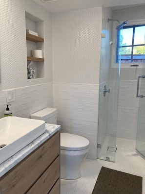 Shower, hair dryer, towels, soap