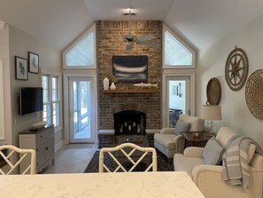 Smart TV, fireplace, DVD player, books