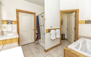 Jetted bath, hair dryer, towels, soap - Country home. (Brinson)