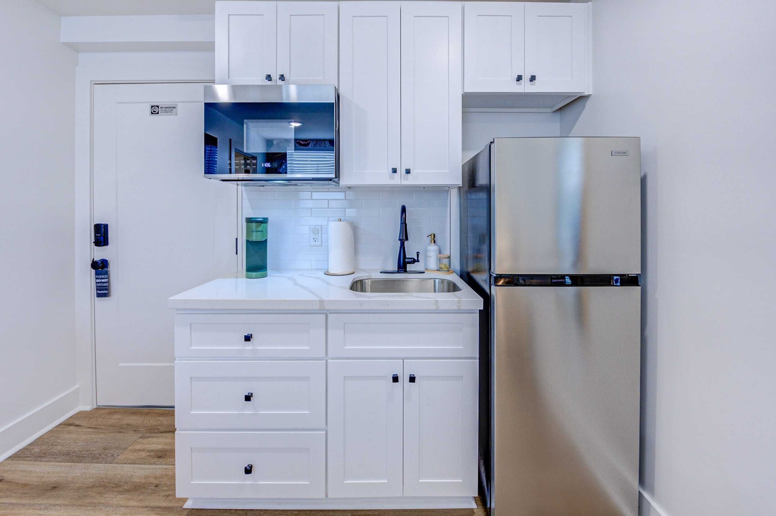 Fridge, microwave, coffee/tea maker, toaster