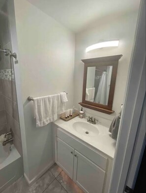 Hair dryer, towels, soap, shampoo