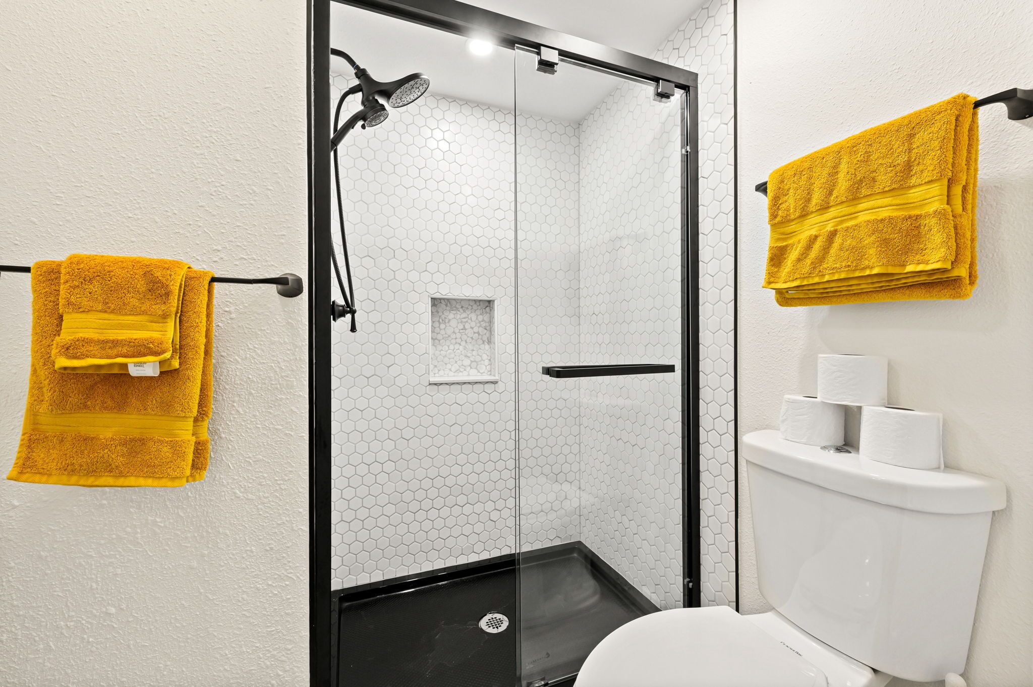 Shower, hair dryer, towels, soap