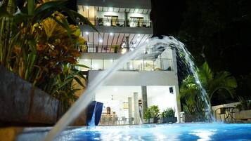 Outdoor pool, open 9:00 AM to 10:00 PM, pool umbrellas