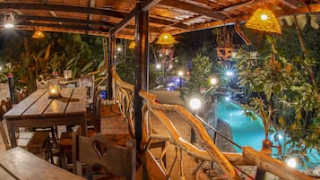 Breakfast, lunch, dinner served; fondue, pool views