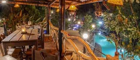 Breakfast, lunch, dinner served; fondue, pool views