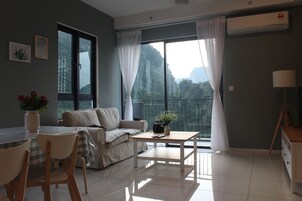 Luxury Apartment, 3 Bedrooms, Mountain View | Living area | 55-inch Smart TV with satellite channels, TV