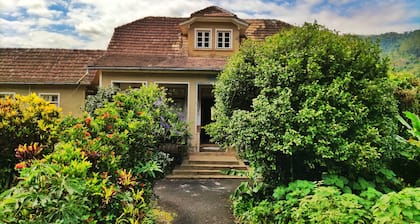 Historic country house with large garden for outdoor activities.