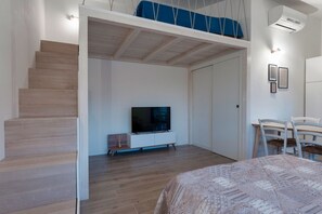 Fer et planche à repasser, draps fournis