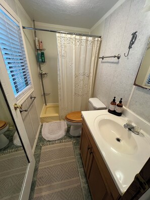 Shower, towels, shampoo