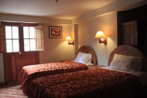 Basic Room | Premium bedding, in-room safe, iron/ironing board, travel crib - AMANI HOSTEL (Arusha)