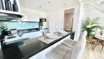 Fridge, microwave, dining tables