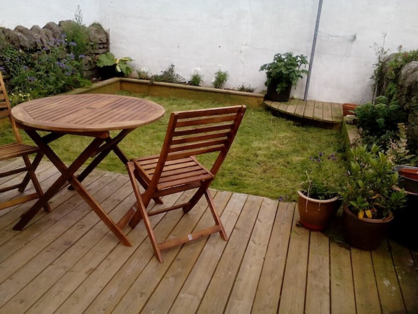 decking, patio furniture and secluded quiet garden