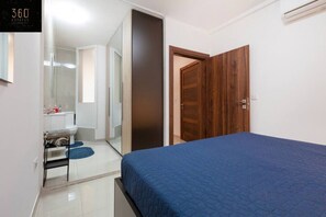 Desk, iron/ironing board, travel cot, free WiFi