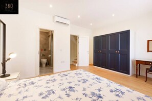 2 bedrooms, desk, iron/ironing board, travel crib