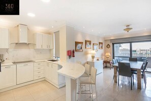 Fridge, oven, dishwasher, high chair