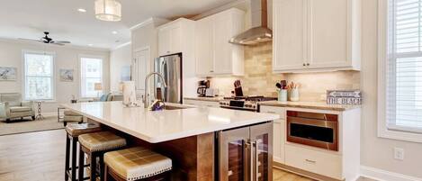 Fridge, dishwasher, cookware/dishes/utensils