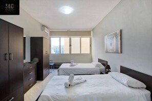 3 bedrooms, desk, iron/ironing board, travel cot