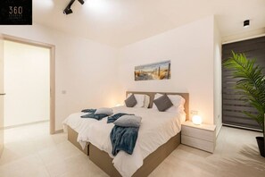 Desk, iron/ironing board, travel cot, free WiFi