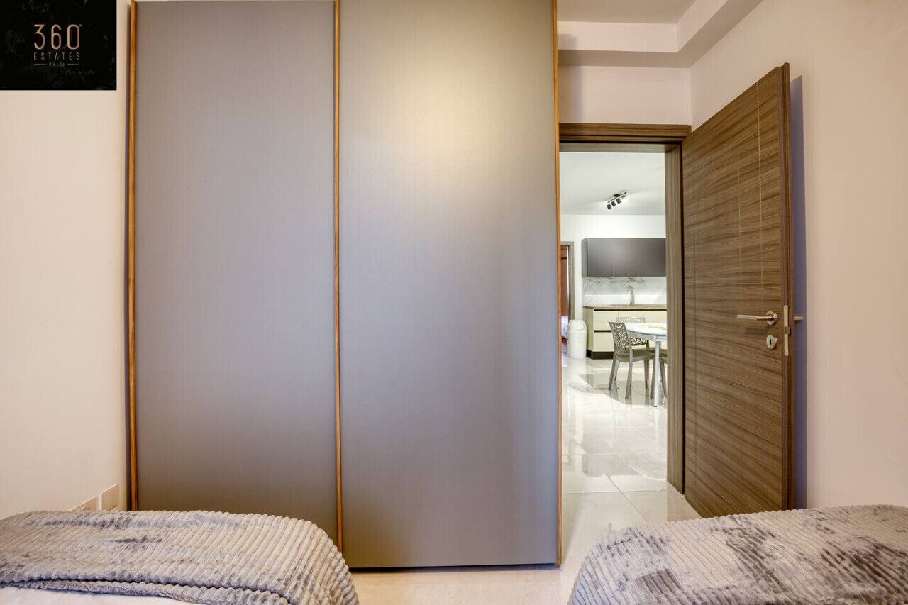 Desk, iron/ironing board, travel crib, WiFi (free)