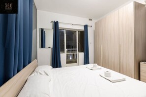 Desk, iron/ironing board, travel cot, free WiFi