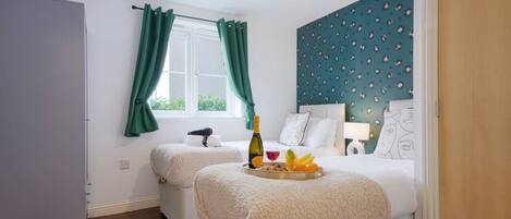 2 bedrooms, desk, iron/ironing board, travel crib