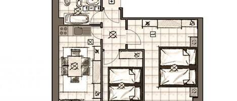 A hotel floor plan with a kitchen, dining area, two bedrooms, and a bathroom.