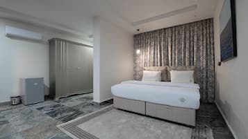 Apartamento ejecutivo | 2 dormitorios, wifi gratis, ropa de cama