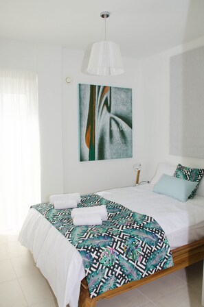 3 slaapkamers, een strijkplank/strijkijzer, reisbedje, wifi