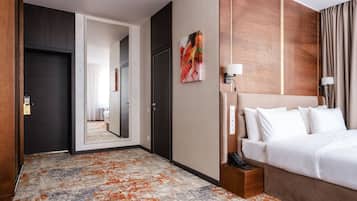 Superior kamer, 1 twee- of 2 eenpersoonsbedden | Luxe beddengoed, een minibar, een kluis op de kamer, een bureau