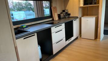 Fridge, microwave, stovetop, coffee/tea maker