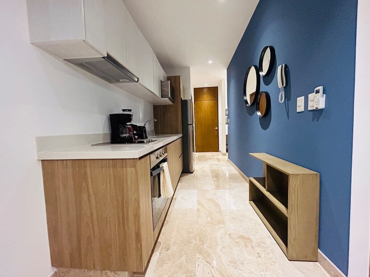 Coffee/tea maker, fridge, microwave, oven