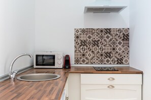 Refrigerador, microondas y tostadora 