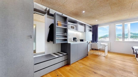 Deluxe Studio | Down comforters, memory foam beds, in-room safe, desk