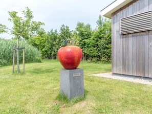 Property grounds - This chalet is situated on the edge of the park (with a view of a lake) and is equipped with all ame (BURGH-HAAMSTEDE)