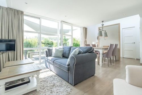 You are guaranteed to unwind and relax in one of the chairs or on the comfy sofa in the central livi