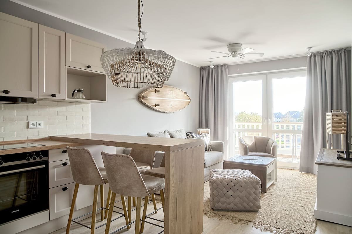 Superior Apartment | Living area | 32-inch flat-screen TV with cable channels, TV