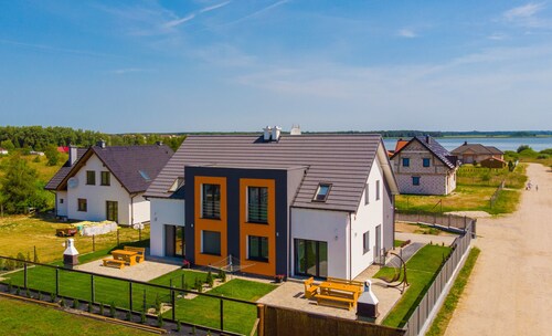 Haus KATAMARAN Ostsee  Seeblick Garten Terrasse Grill W-Lan Spielplatz Angeln