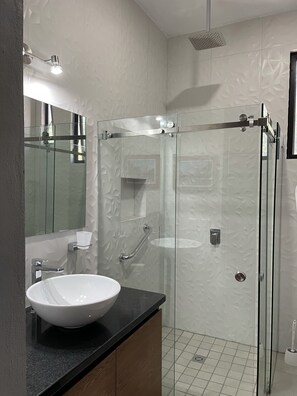 Shower, towels, soap, toilet paper