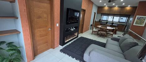 Smart TV, fireplace, DVD player, books