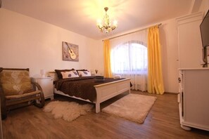 Grand Villa, 2 Queen Beds, Private Bathroom, Garden View | Iron/ironing board, free WiFi, bed sheets