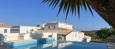 Outdoor pool, open 8:00 AM to 7:30 PM, pool umbrellas, pool loungers